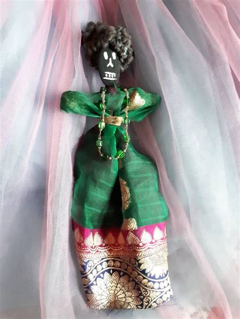 The Intriguing Allure of Vodou Dolls in Henati Art